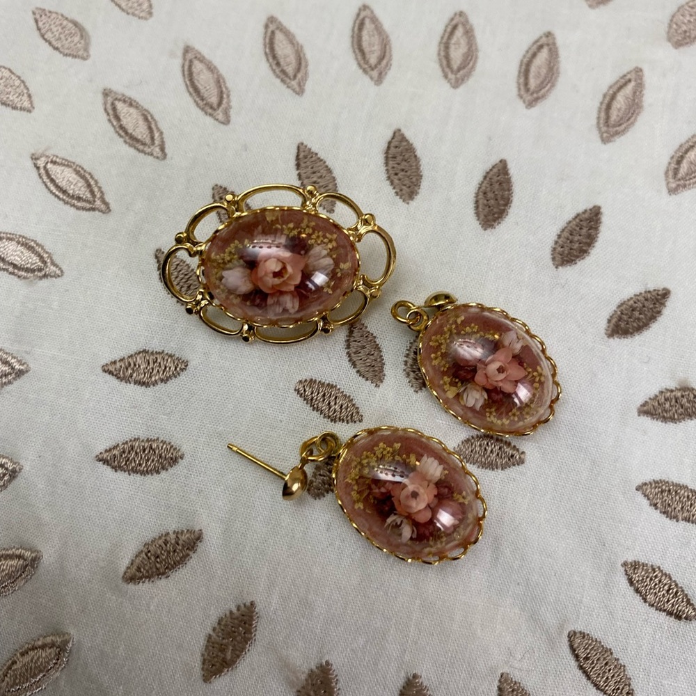 Dry flowered earrings and pin.